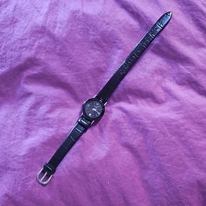 Elegant black Avon wrist watch with faux alligator band & rhinestone at 12
